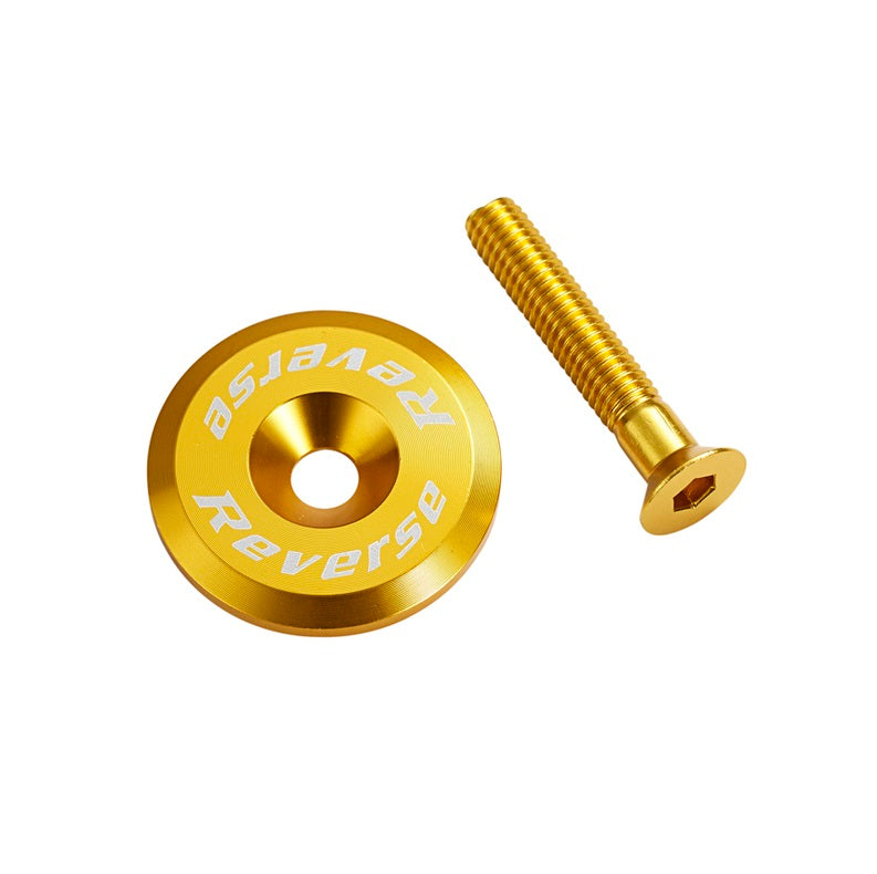 REVERSE KOMPONENTER 1"1/8 Guldplugg