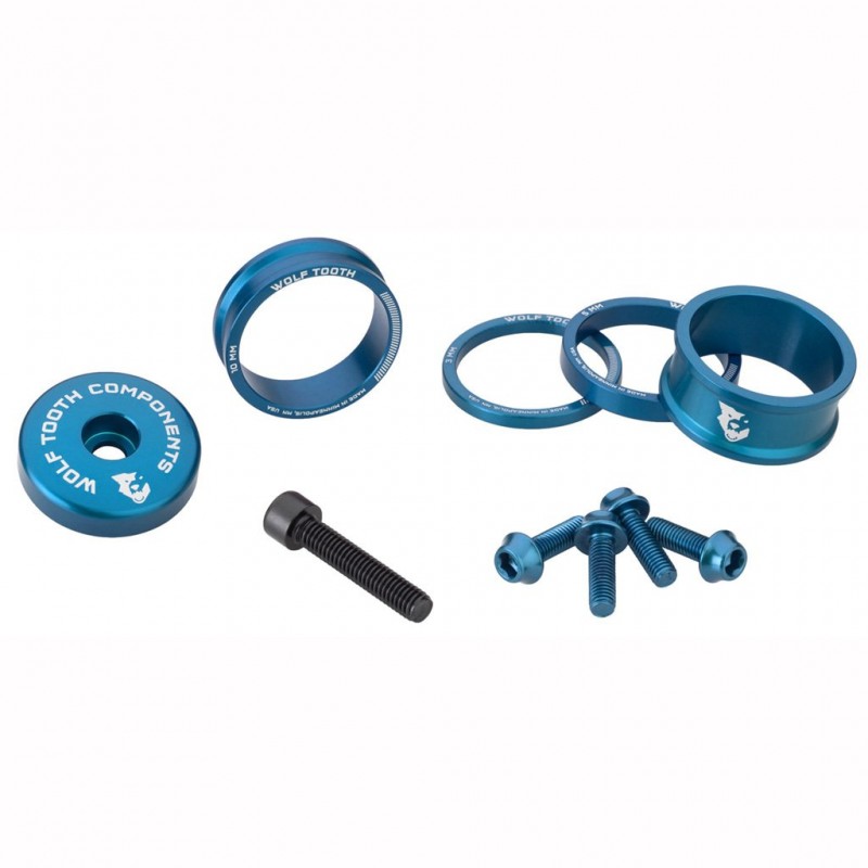 Sats med distanser, skaftskydd och skruvar WOLFTOOTH BLING KIT Blå