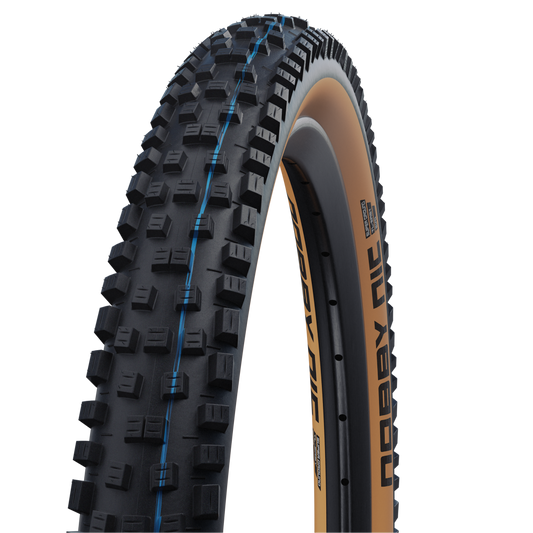 SCHWALBE NOBBY NIC 27.5x2.40 ADDIX SPEEDGRIP SUPERGROUND Tubeless Ready Soft Black/Brown däck