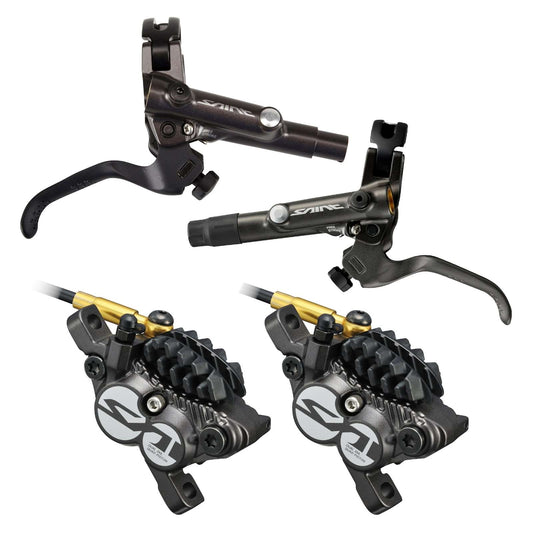 Ett par SHIMANO SAINT M820 J-KIT Discless-bromsar
